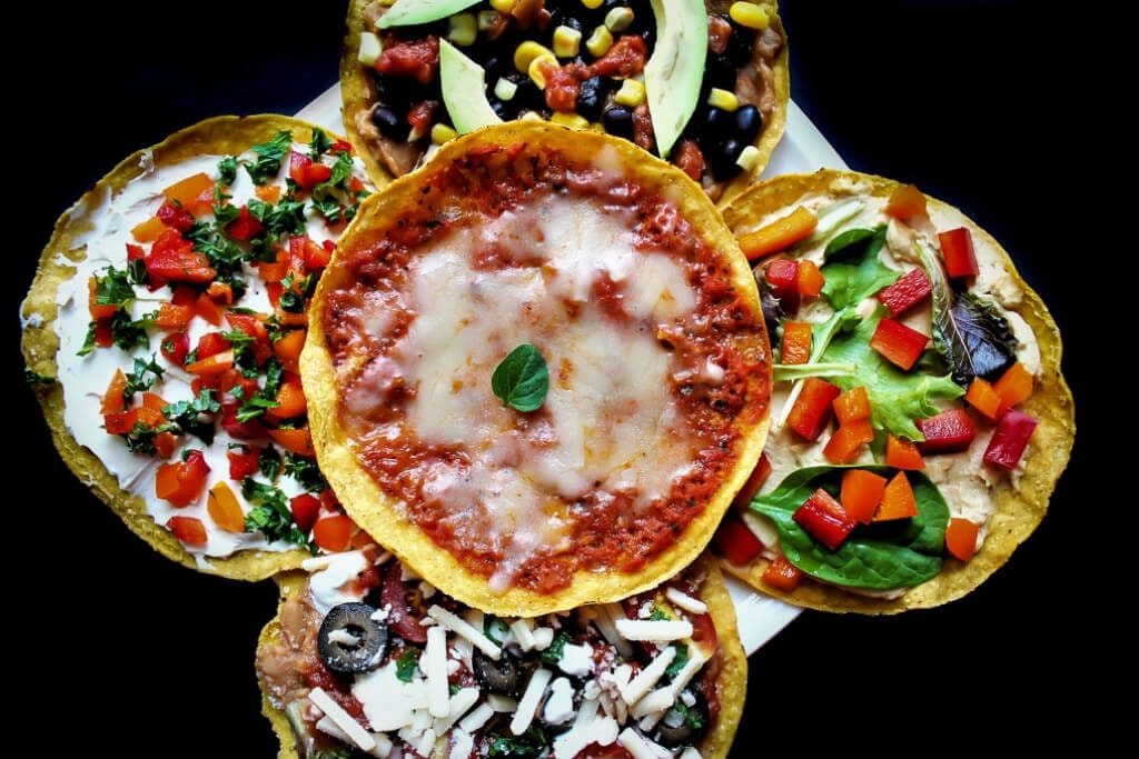 tostada shells decorated and stacked on each other.