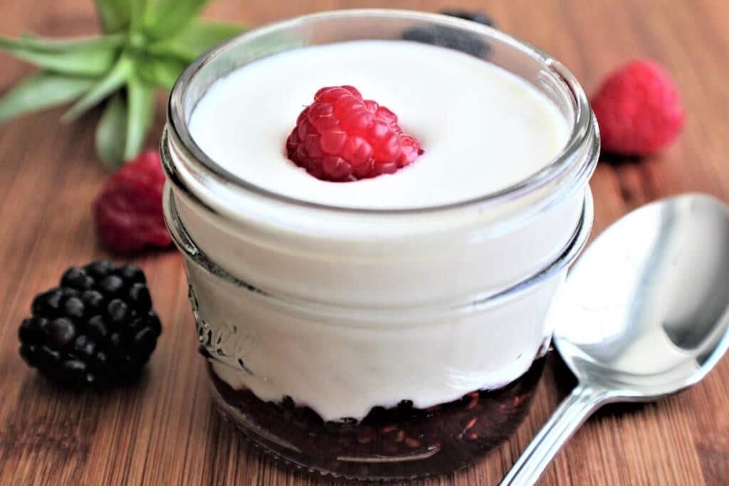 Homemade raspberry fruit on the bottom soy yogurt.