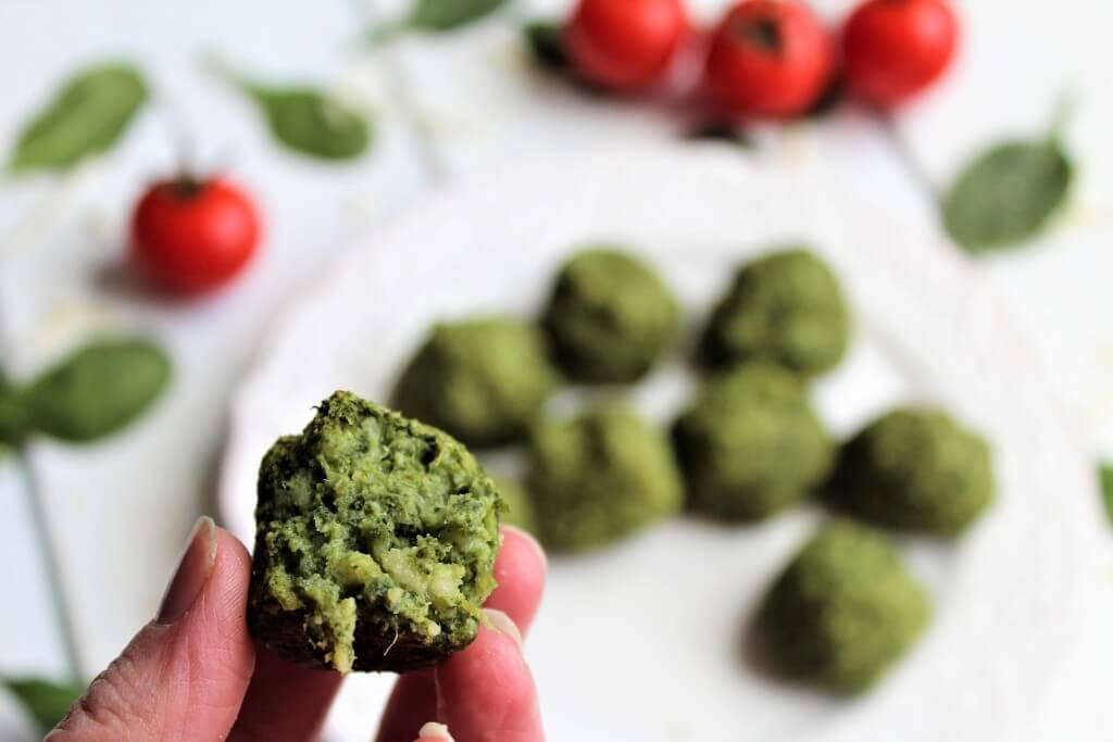 A close up of a vegan spinach ball.