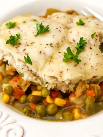 A vegan pot pie that was made in a slow cooker on a white plate.