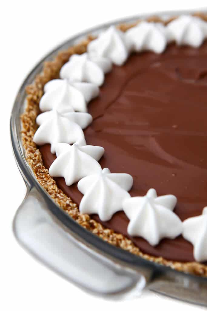 A gluten-free pie crust filled with a vegan chocolate pie.