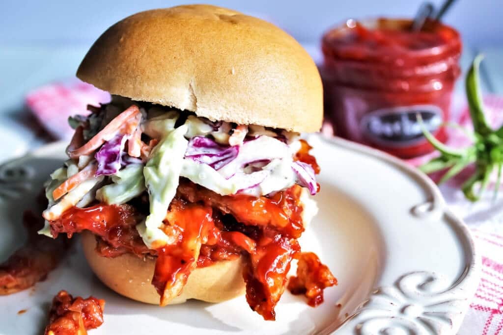 A vegan pulled pork sandwich made with Butler soy curls and sugar free barbecue sauce. 