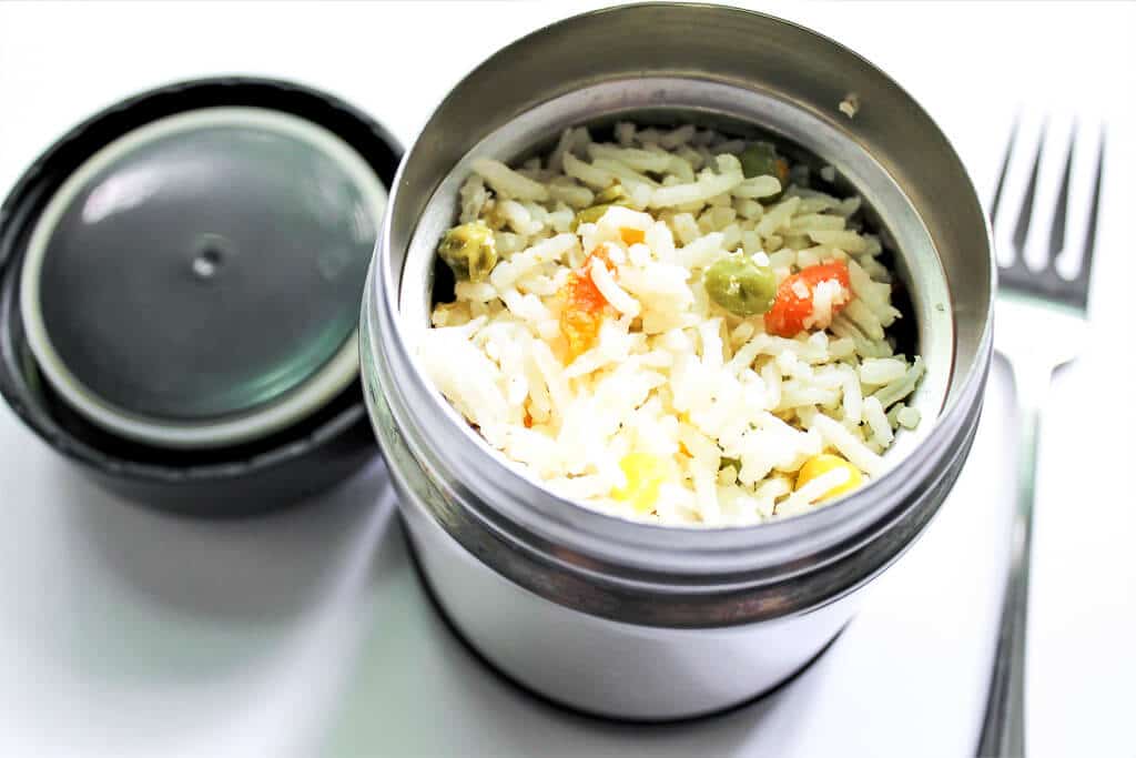 A thermos filled with vegan Thai coconut rice.