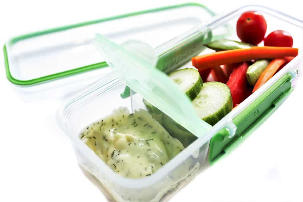 Veggies with vegan ranch packed for a vegan kids lunch.