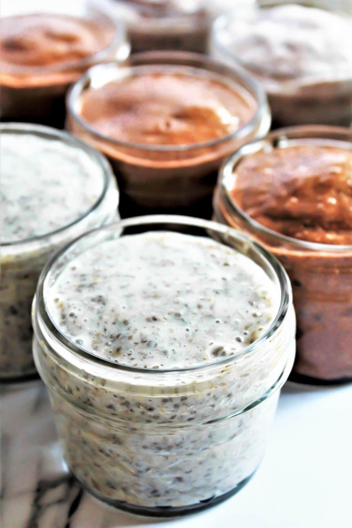 Little chia seed puddings cups made in 4 flavors and put into 4 oz mason jars.