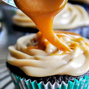 A gluten free vegan chocolate cupcake with vegan caramel frosting.