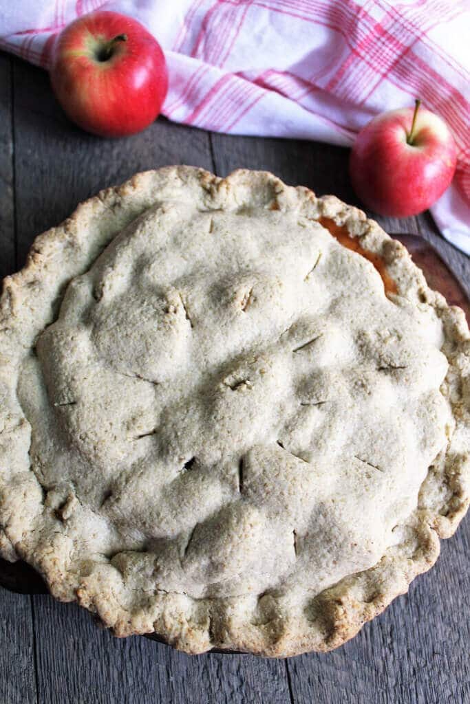 A top view of a gluten free vegan apple pie made with a top crust.