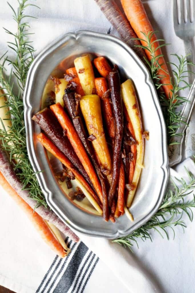 A platter full of colorful carrots for a gluten free vegan Thanksgiving.