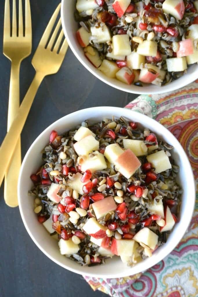 A lentil salad with apples and pomegranate for a gluten free vegan Thanksgiving side.