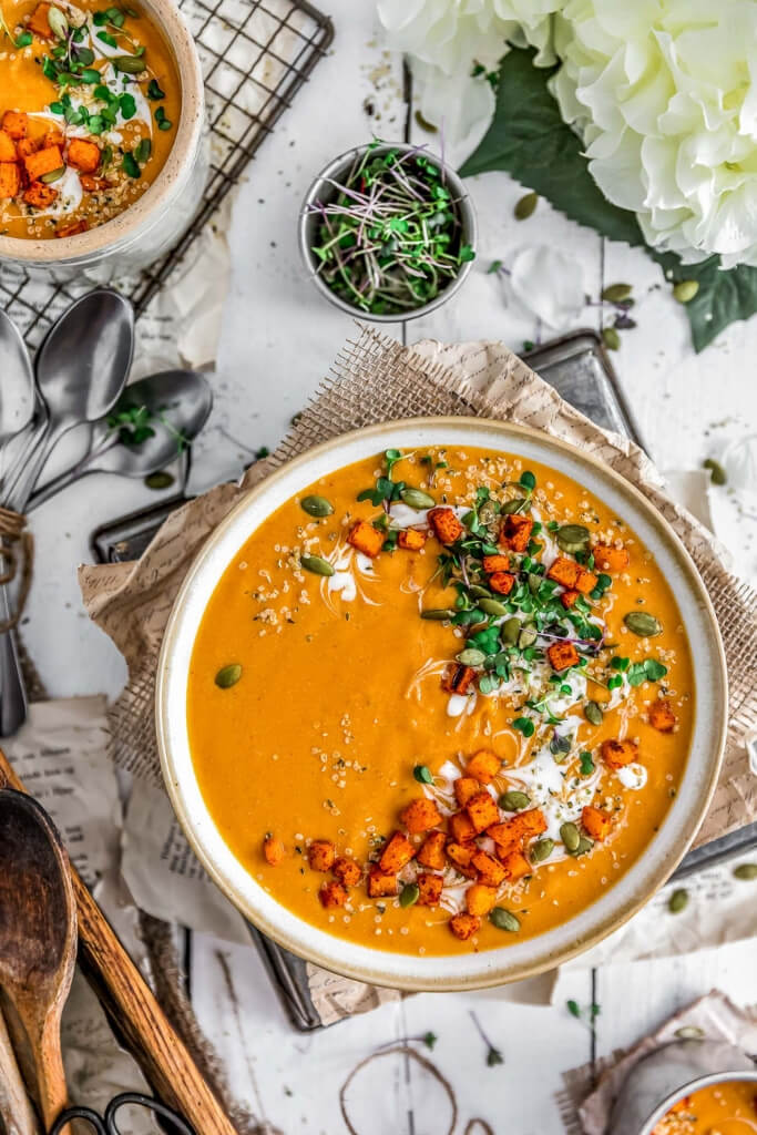 Creamy smokey butternut squash soup that can be served as a gluten free vegan side on Thanksgiving.