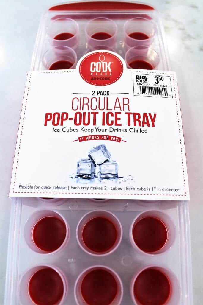 A circular ice tray with silicone bottoms used to make chocolates.