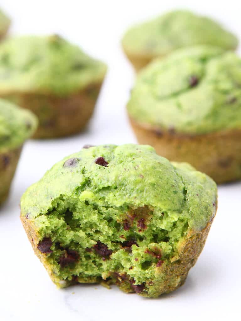 A close up of a bright green hulk muffin.