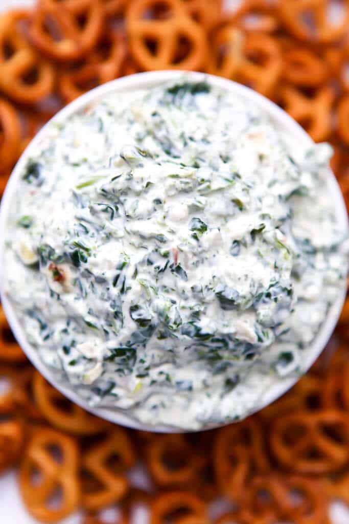 The top view of a bowl of vegan spinach dip.