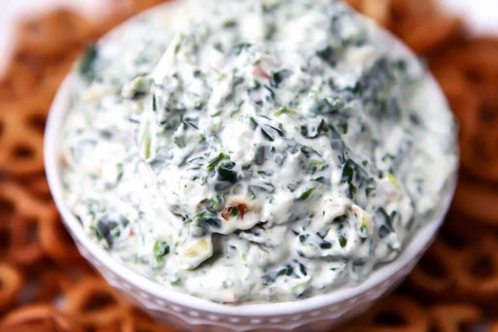 Easy spinach dip made with vegan mayo, vegan sour cream, and soup mix.