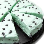 A light-green dairy-free grasshopper pie cut into slices.