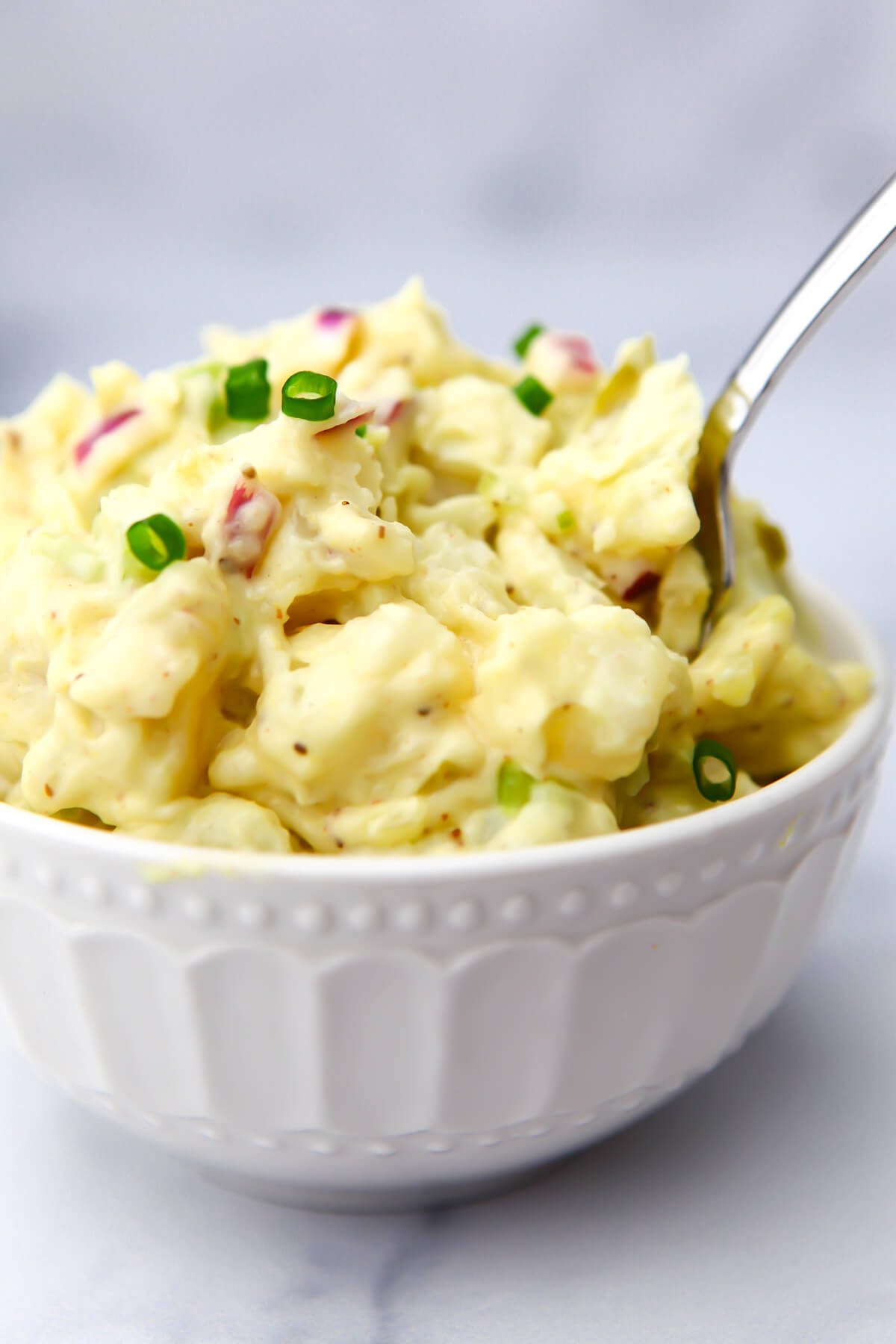 A close up of a creamy vegan potato salad.