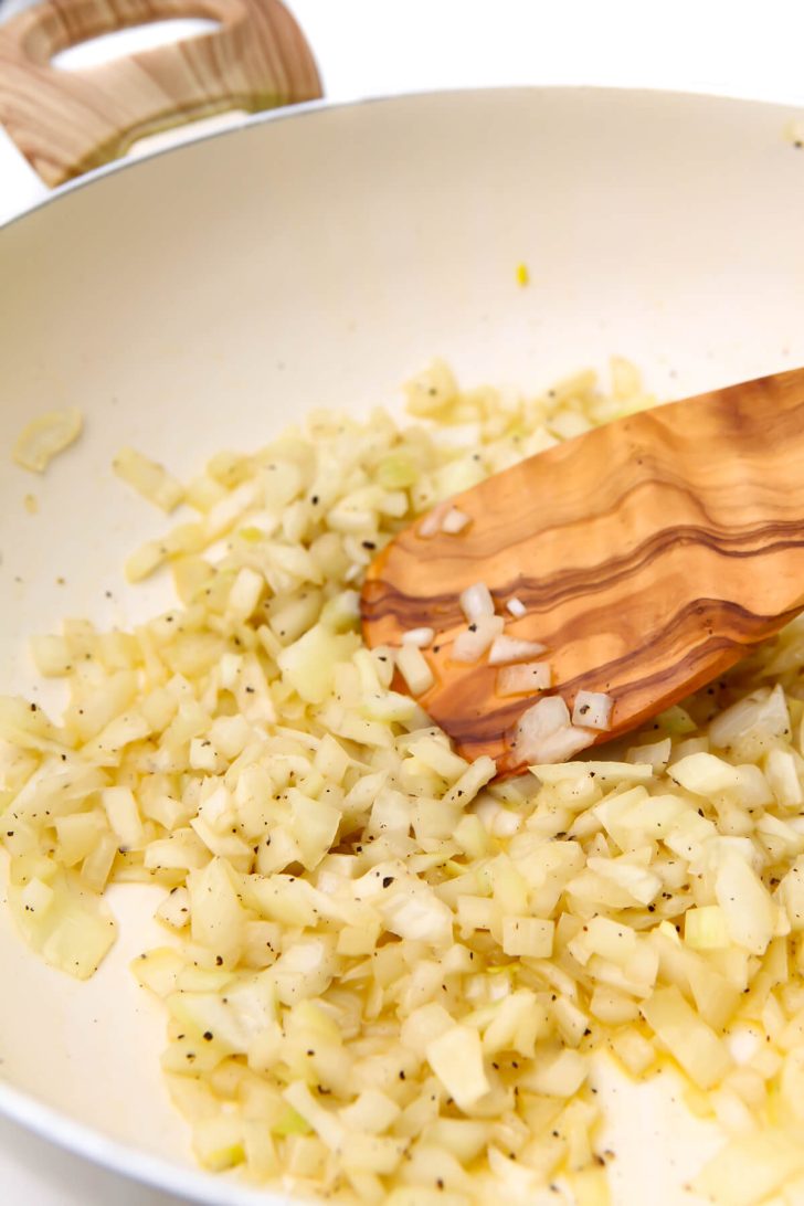 Sautéed onions to make vegetable chop suey.