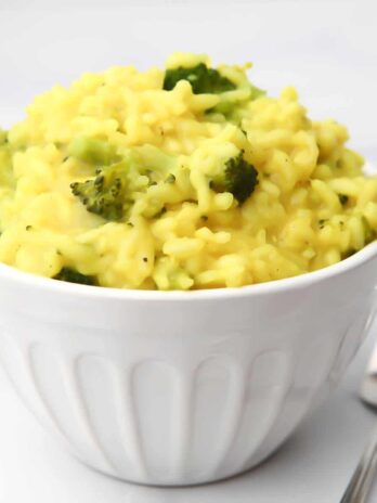 A white bowl filled with vegan broccoli risotto.