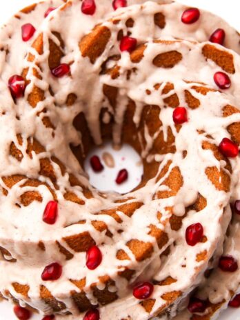 A top view of a vegan bundt cake with eggnog flavored icing.