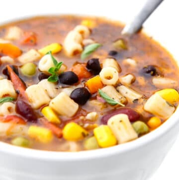 A close up of a bowl of classic vegan minestrone soup.