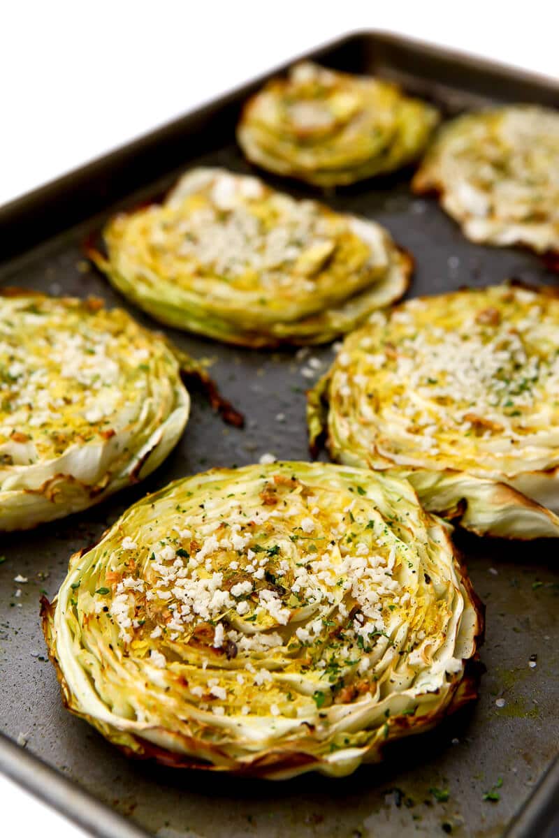Vegan cabbage steaks with nutritional yeast and panko bread crumbs.