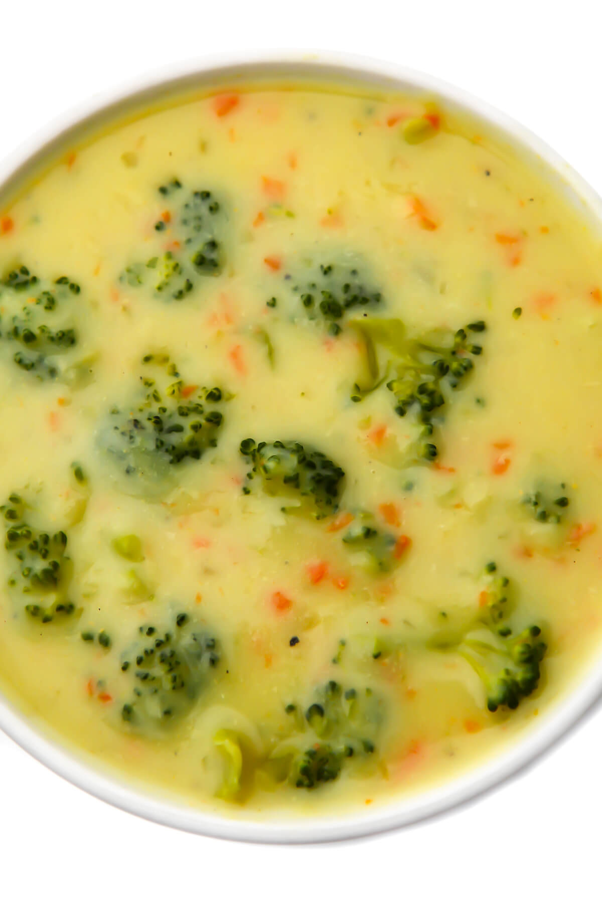 A top view of a bowl of cream of dairy-free broccoli soup.