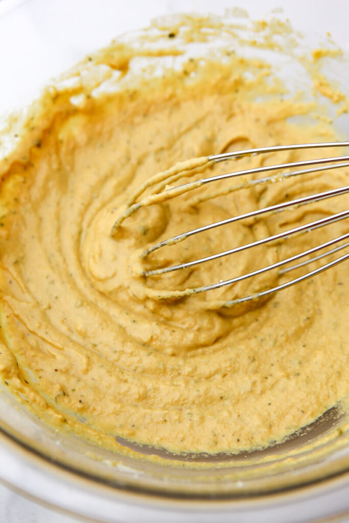 A thick chickpea flour batter mixed with only half of the water to get out lumps.