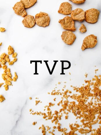 Three different sizes and shapes of TVP on a marble counter top showing chunks, large crumbles, and small crumbles.
