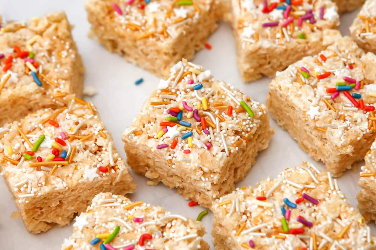 A top view of vegan rice krispie squares on a white countertop.