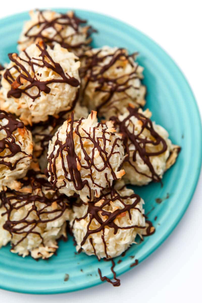 A blue plate filled with egg-free coconut macaroon cookies.