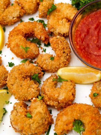 A close up of battered and deep fried vegan shrimp.