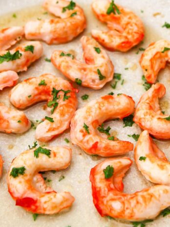 A close up of vegan shrimp cooking in an skillet.