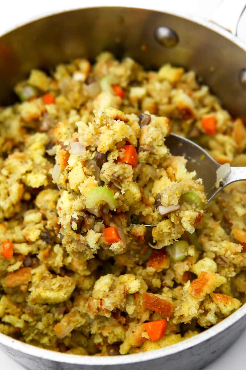 A pot filled with vegan stovetop stuffing with veggies.