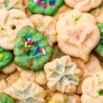 A close up of vegan spritz cookies in many shapes and colors.