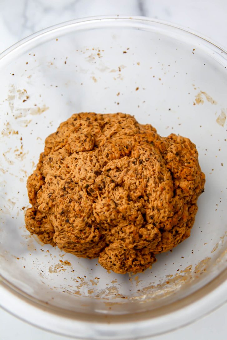 The beef seitan after the wheat gluten has been added and formed a firm dough ball.