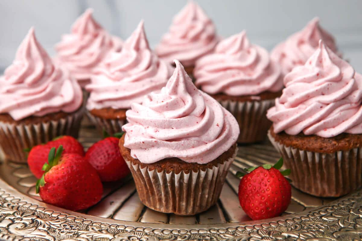A try full of dairy-free strawberry cupcakes.
