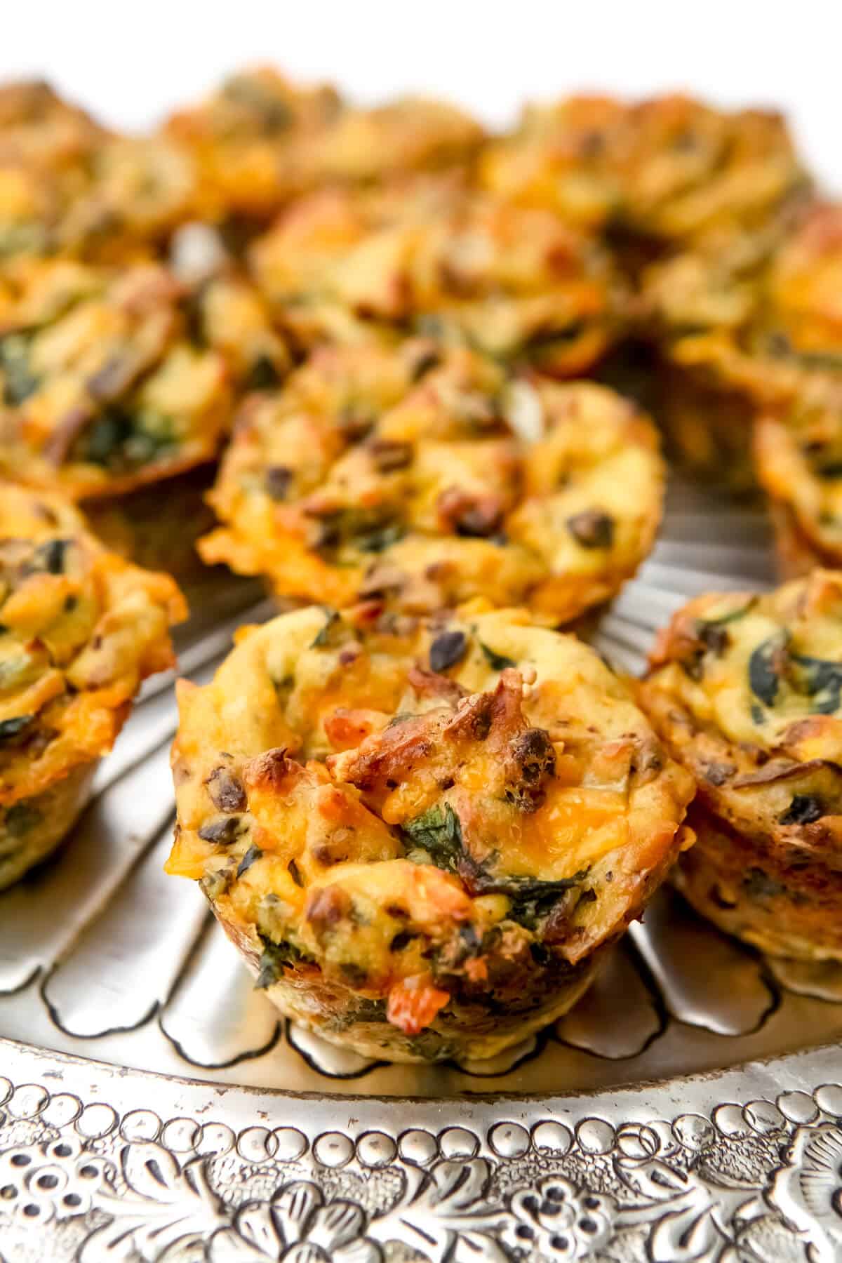 Savory vegan muffins on a serving tray.