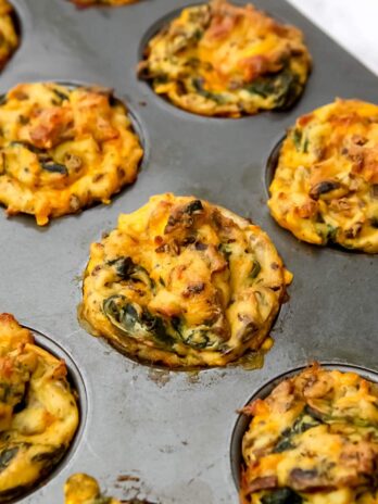 Savory vegan muffins in a muffin tin.