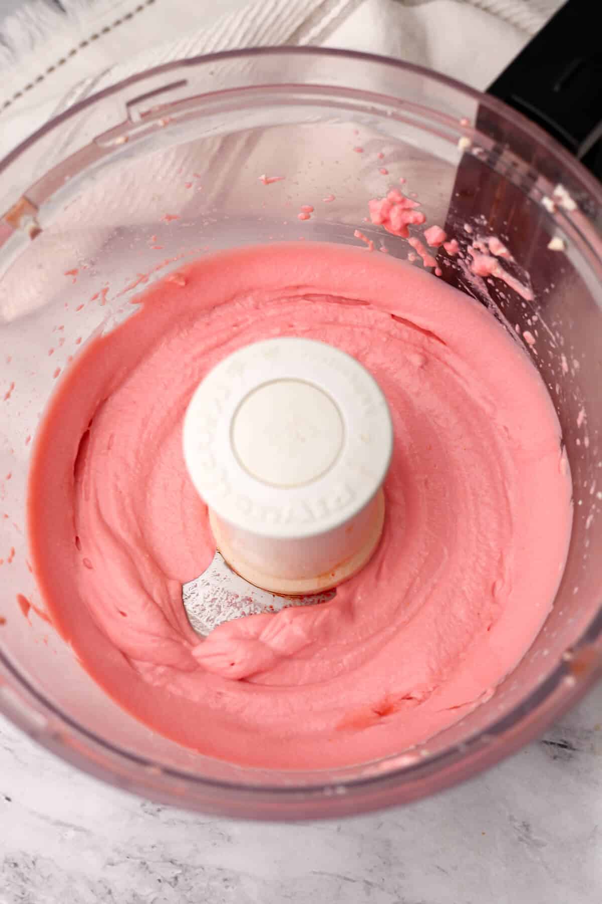 Pureed tofu, ketchup, and broth in a food processor.