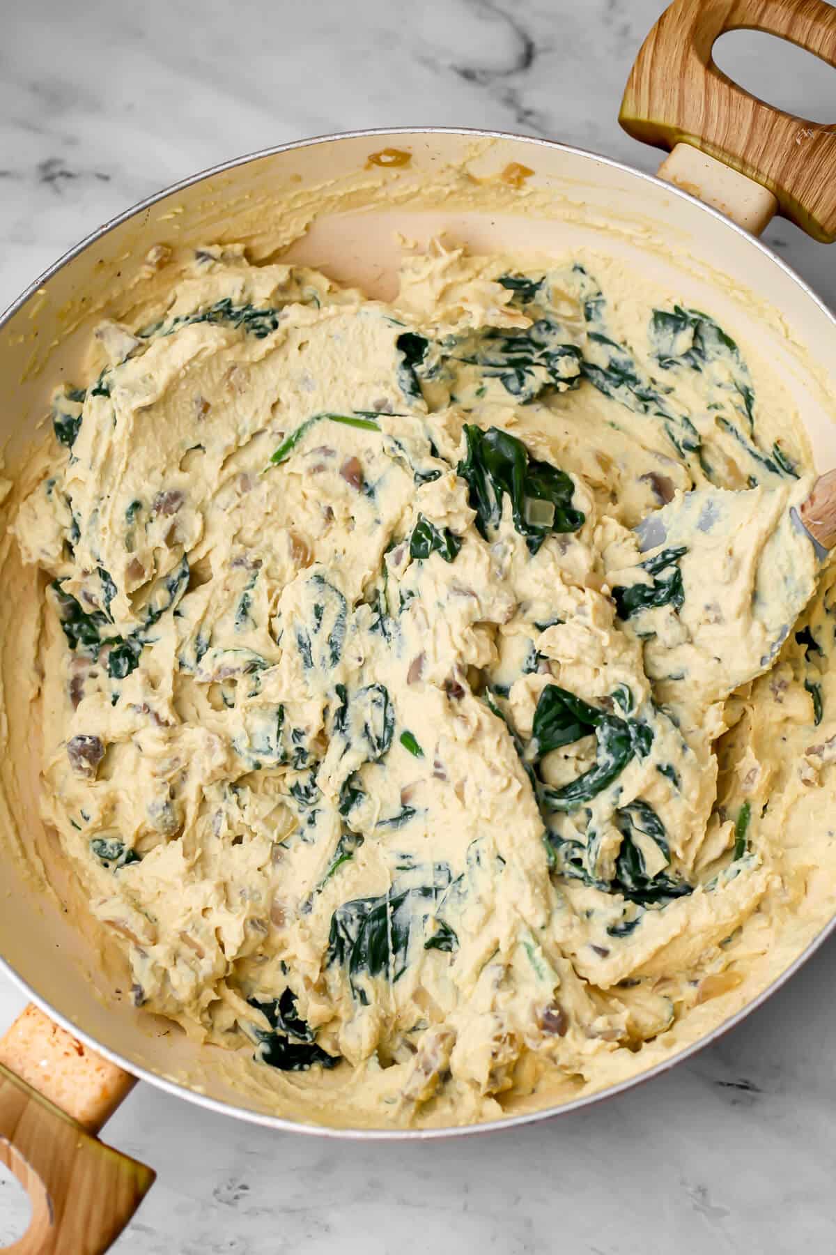 Blended tofu added to sauteed onions, mushrooms and spinach.