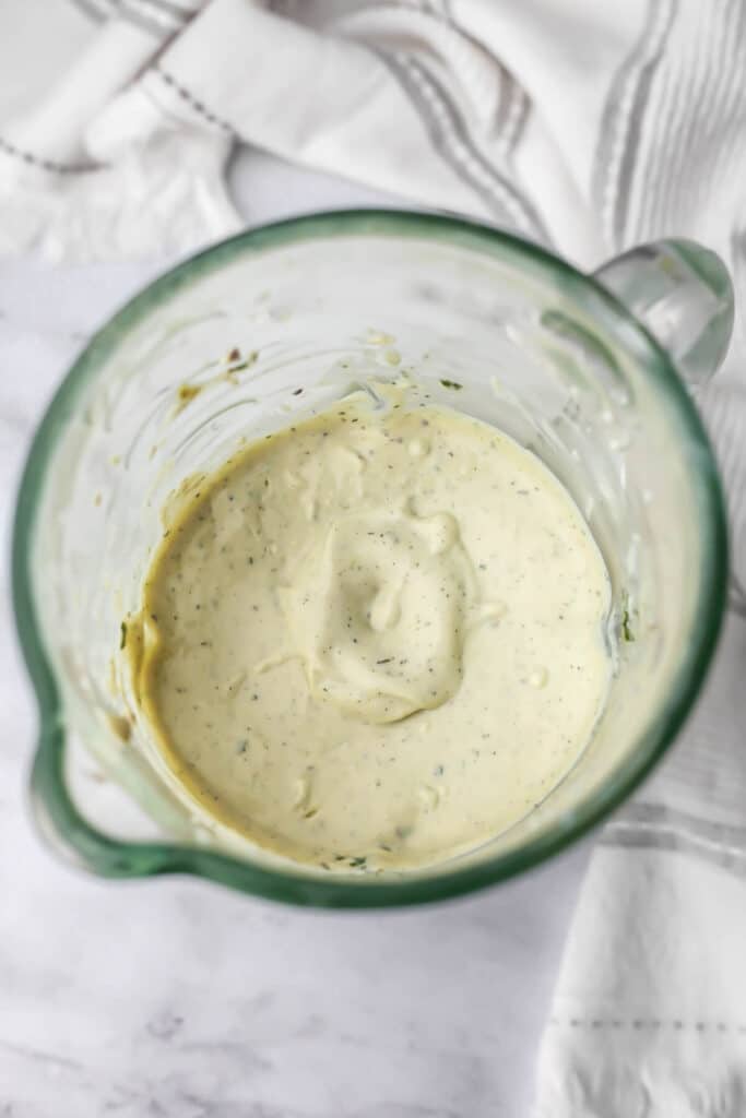 Vegan tofu dip in a blender after it has been blended.