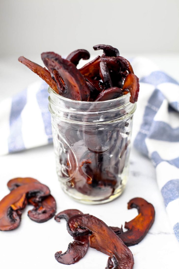 Vegan mushroom jerky in a glass jar.