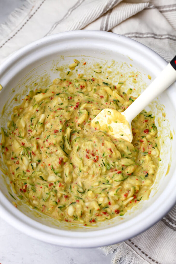 The batter for the vegan zucchini slice mixed together.