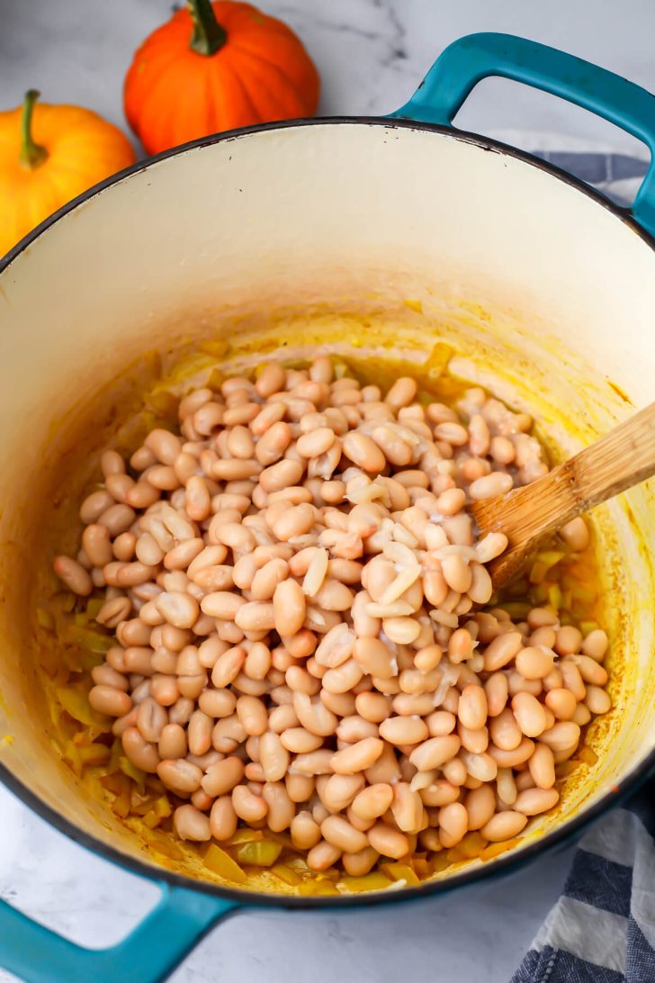 White beans added to the onions and spices.