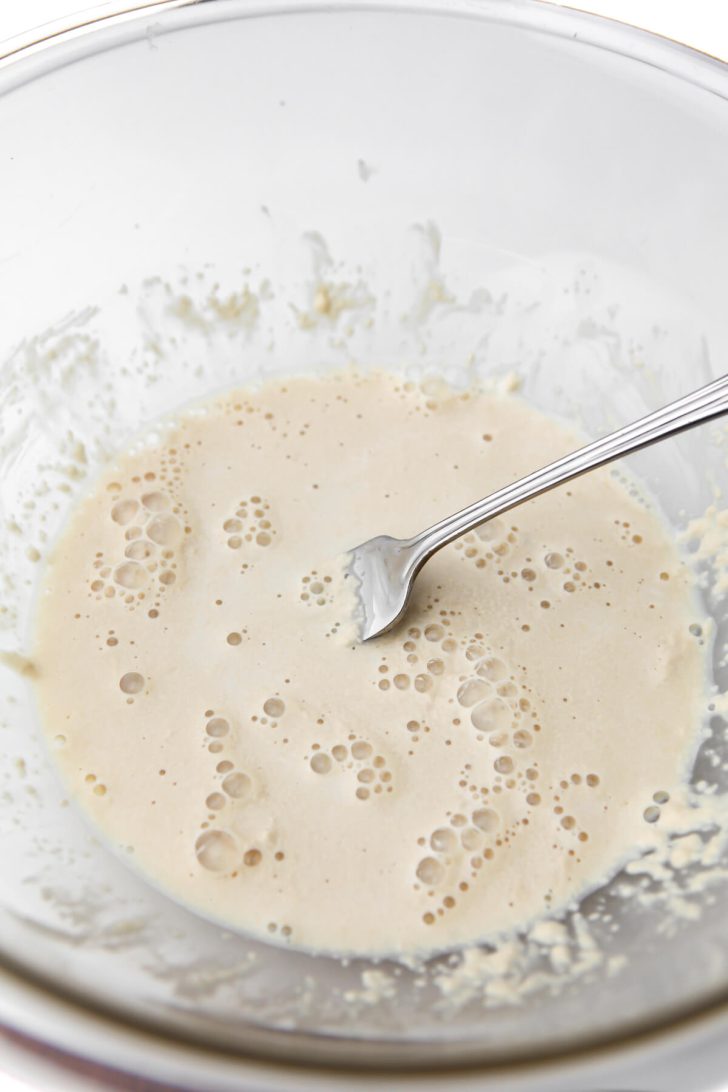 Plant based milk with yeast added to make vegan sticky buns.