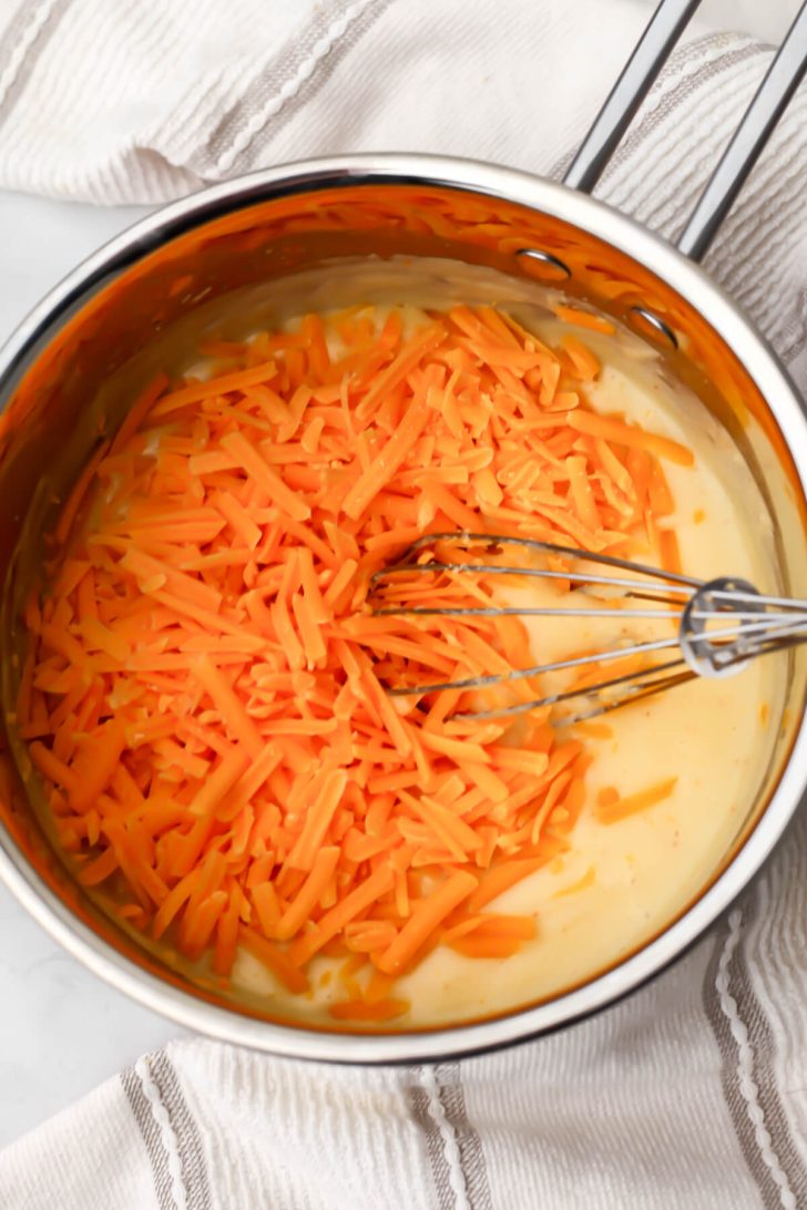 Shredded vegan cheddar cheese added to the beer cheese sauce.