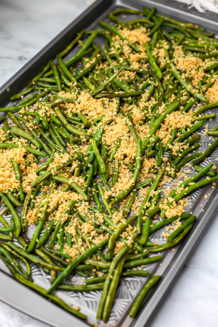 Garlic breadcrumbs sprinkled on roasted green beans.