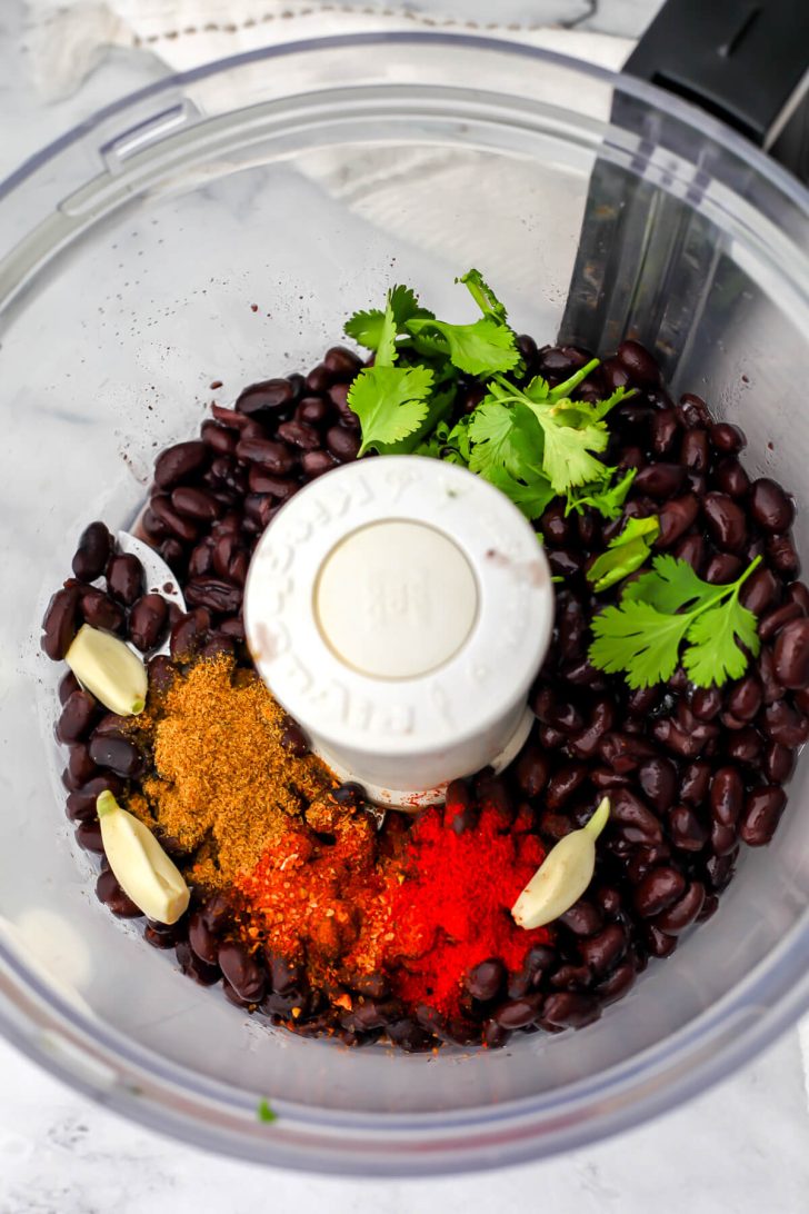 Black bean taco filling in a food processor before it is blended.