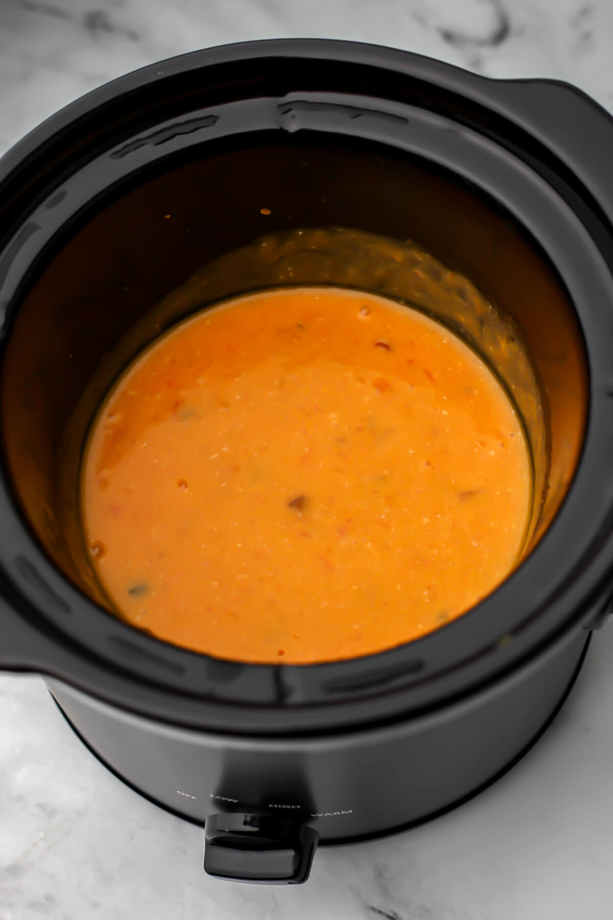 Easy vegan queso in slow cooker.