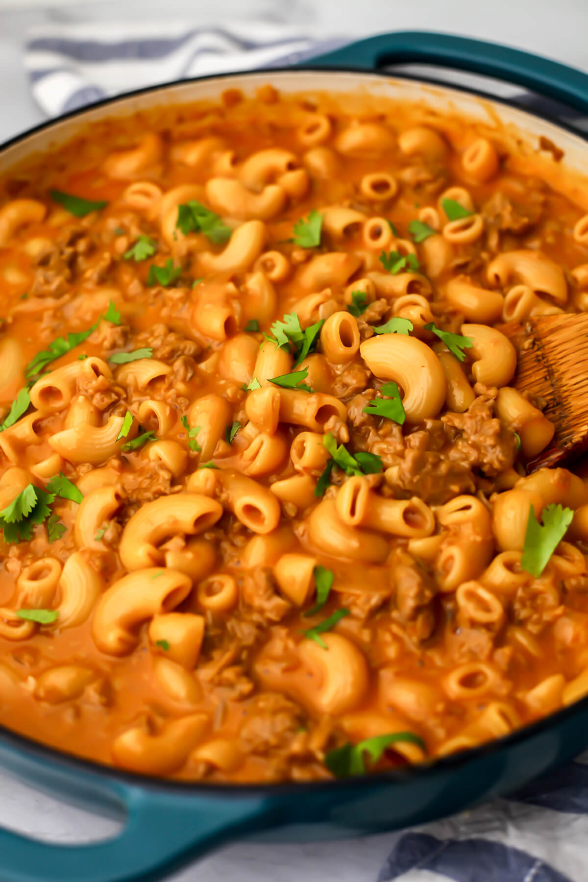 Vegan hamburger helper in a blue skillet after cooking.